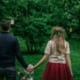 couple-walking-in-woods