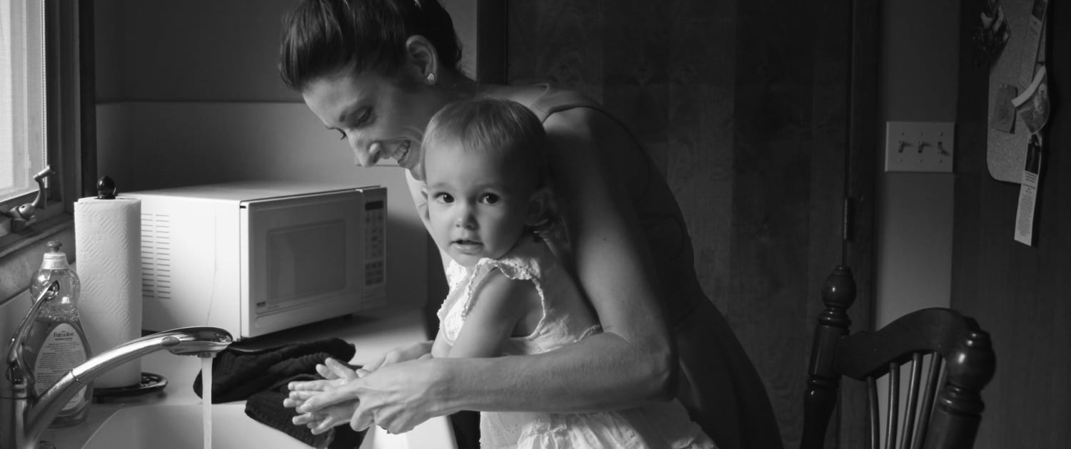 mom-and-daughter-at-sink