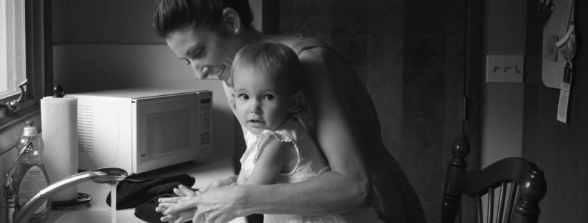 mom-and-daughter-at-sink