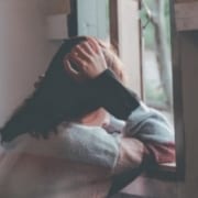 sad-woman-at-window