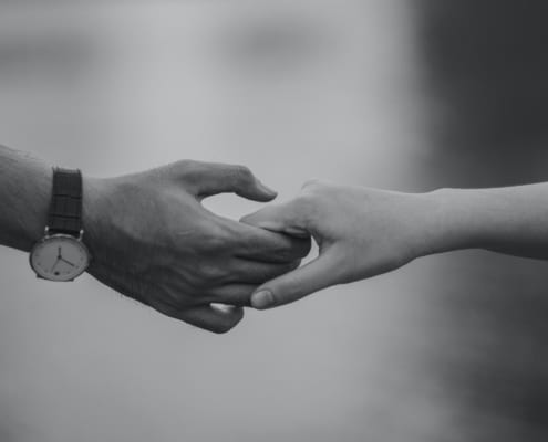 couple holding hands
