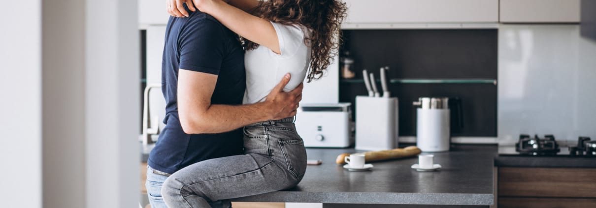 couple in kitchen - newlywed game