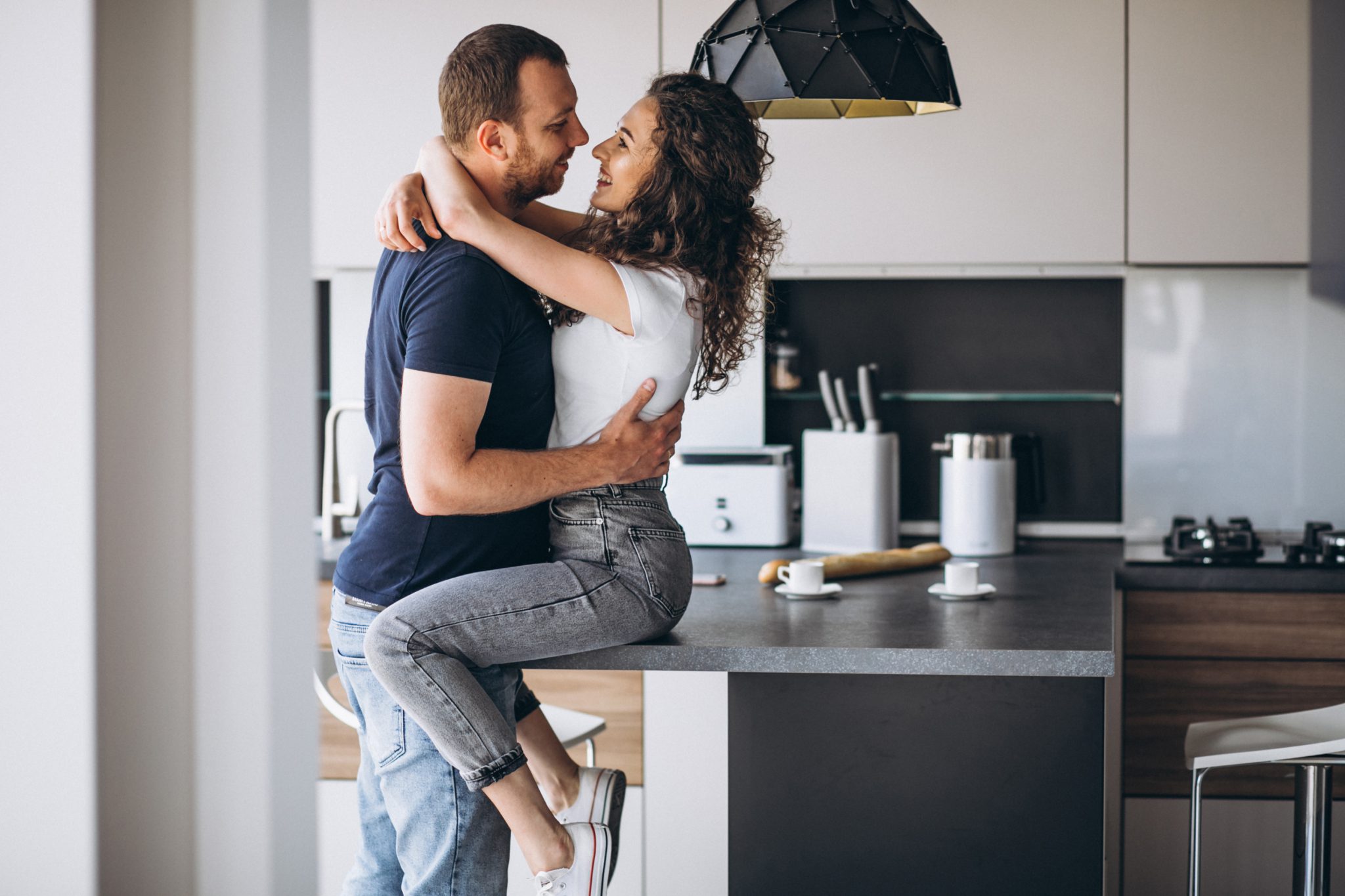 couple in kitchen - newlywed game
