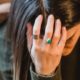 sad woman with hand on head