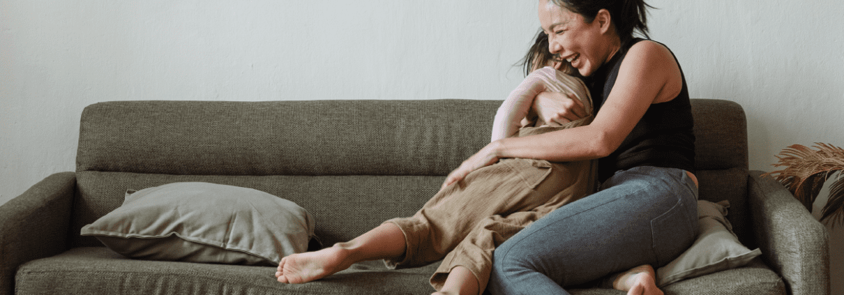 woman hugging her daughter