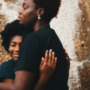 Hugging mother and daughter