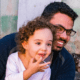 dad and daughter smiling