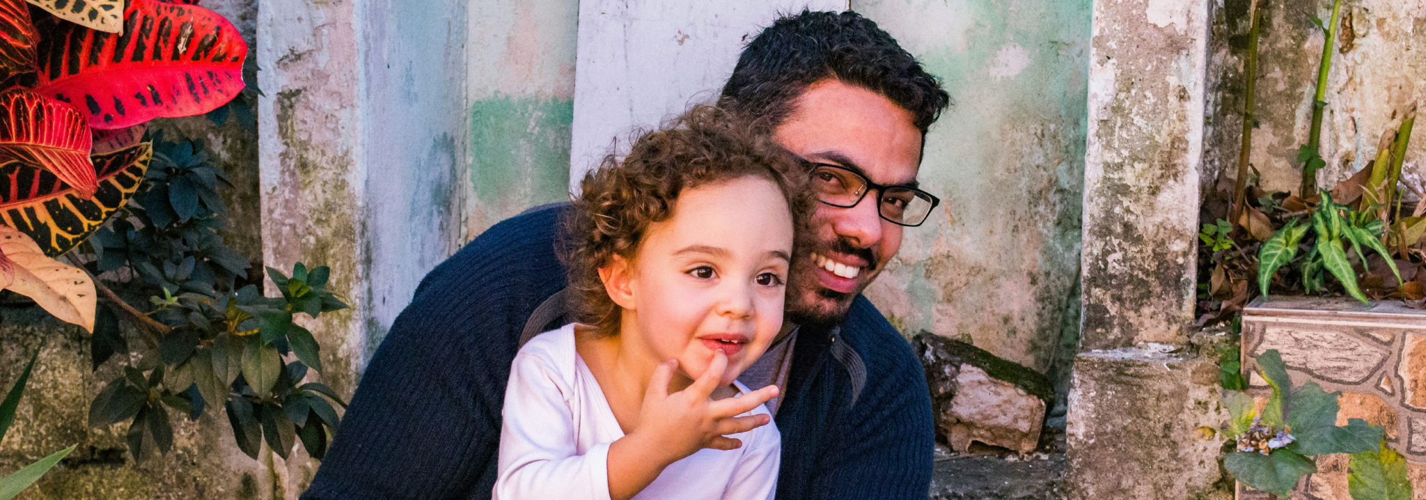 dad and daughter smiling