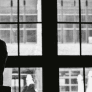 Sad woman looking out a window
