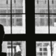 Sad woman looking out a window